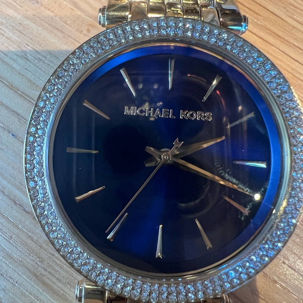 Michael Kors Blue dial, embellished gold toned watch